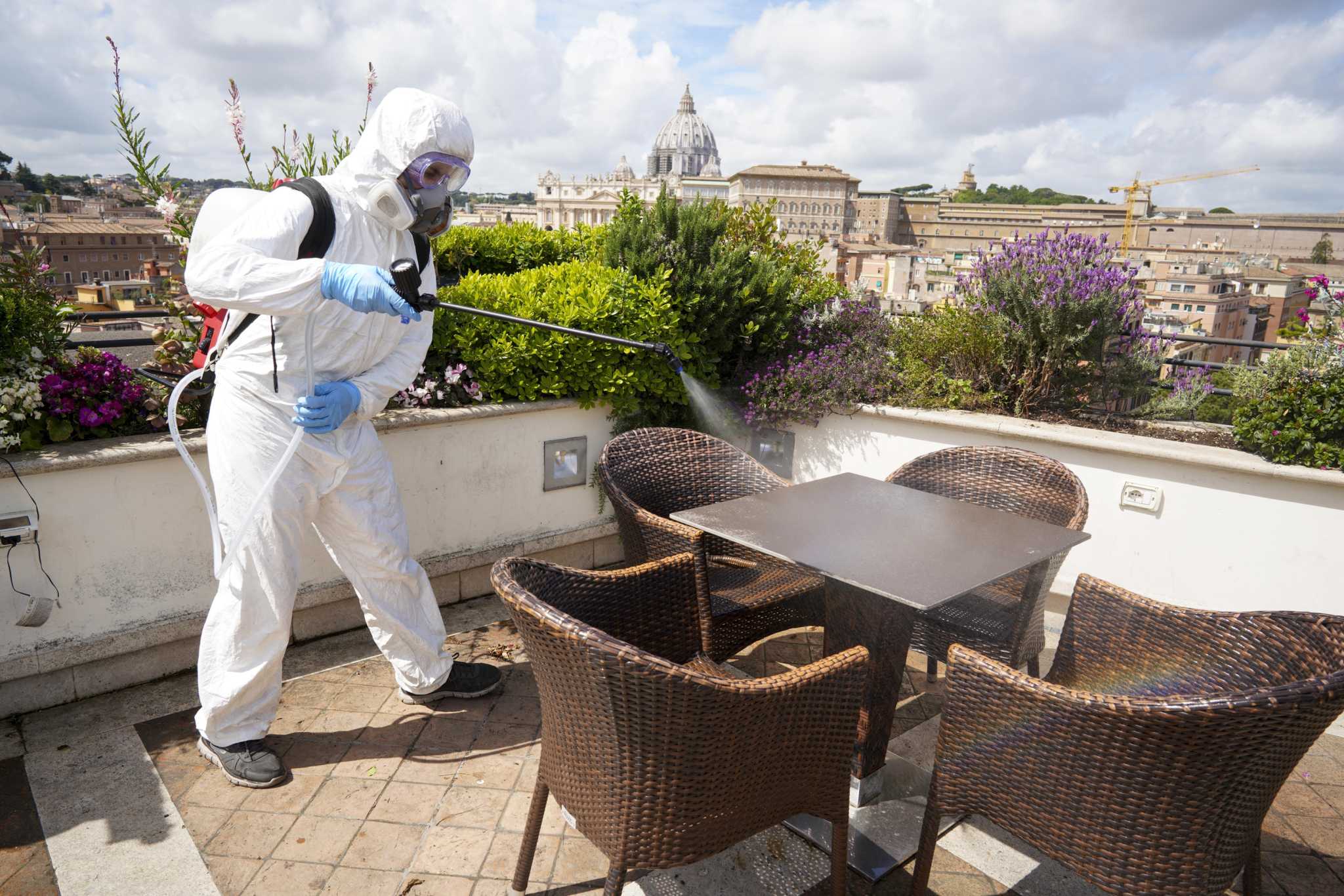 man killing germs on a table